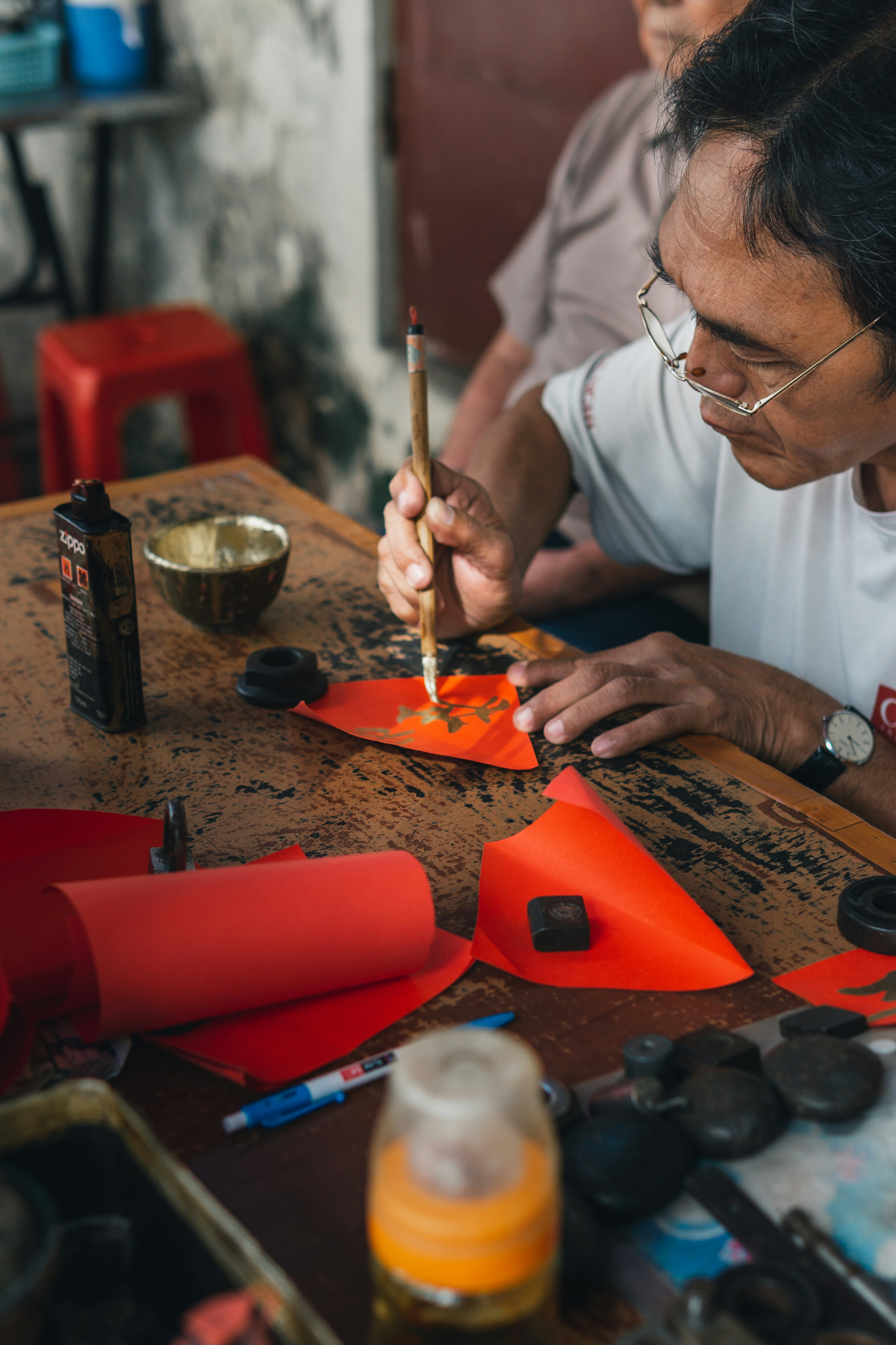 Traditional Chinese calligraphy on red paper, symbolizing prosperity and good fortune for the Year of the Wood Snake 2025