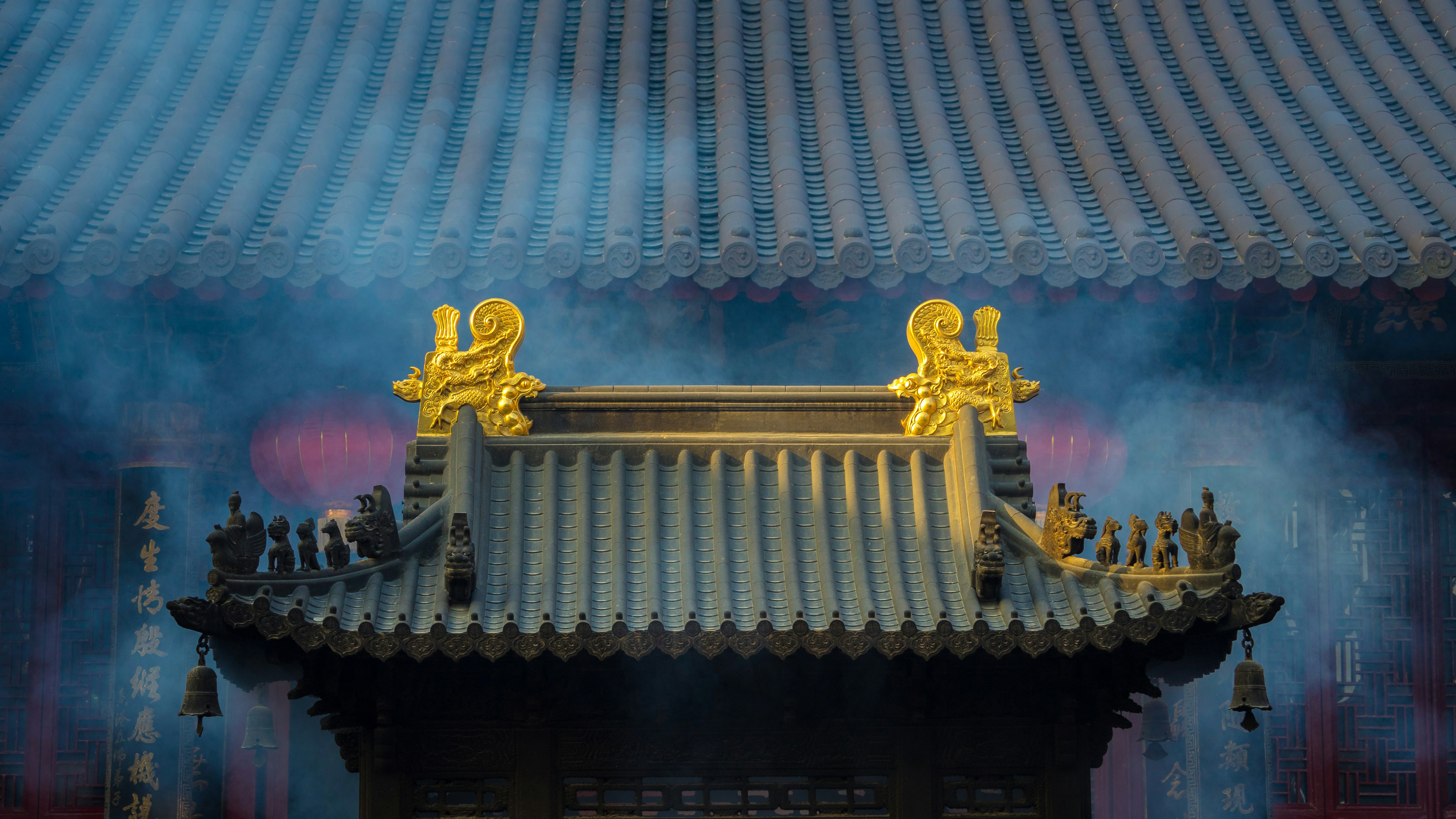Traditional Chinese temple roof with golden dragons, symbolizing prosperity and fire energy for 2026 Year of the Fire Horse